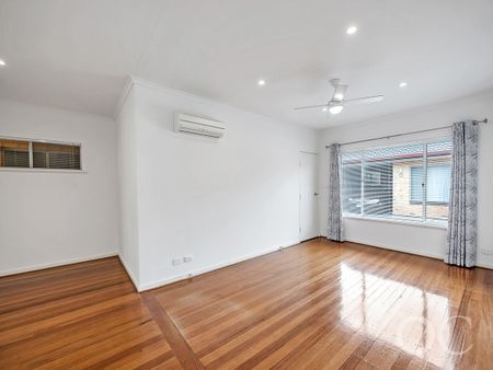 Open the Door to Light-Filled Living with a Private Courtyard Retreat - Photo 3