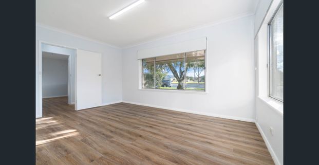 RENOVATED TWO BEDROOM UNIT WITH MODERN COMFORTS - Photo 1