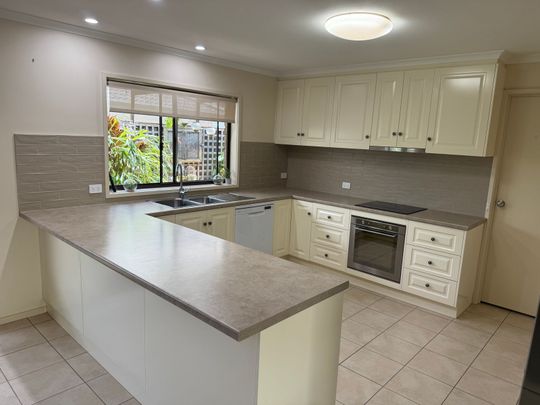 Comfortable Family Living in a Great Location - Photo 1