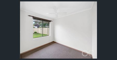 Open the Door to Comfortable Family Living in a Spacious Burton Home - Photo 4