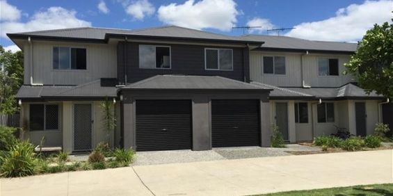 Stylish 3-Bedroom Townhouse in the Heart of Redbank Plains - Photo 3
