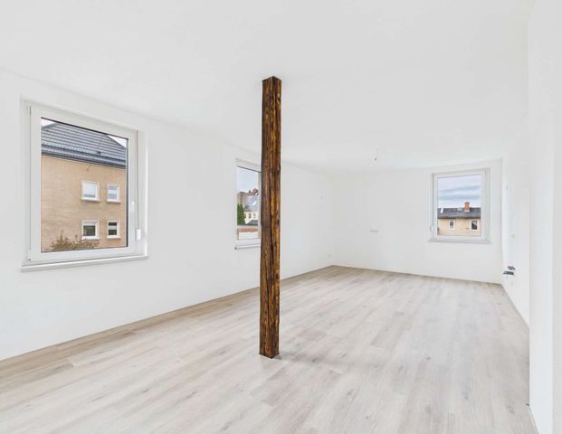 Erstbezug: charmante 3-Zimmer-Wohnung mit Garten in Auerbach - Foto 1