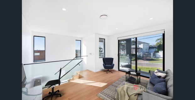 Brand New 4-Bedroom Waterfront Duplex - Photo 1