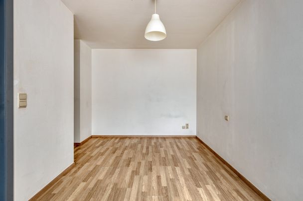 Gelijkvloers 1 slpk.-appt met terras in Sint-Truiden - Foto 1