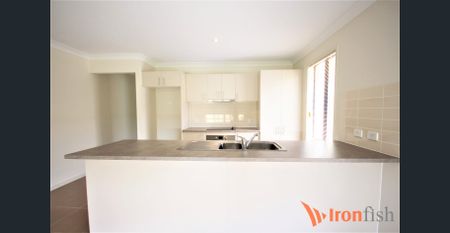 Modern Family Home with Space, Style, and Exceptional Value - Photo 3