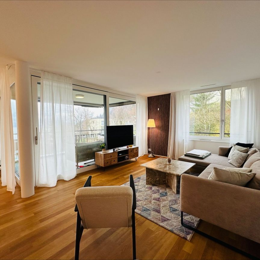 Exclusive 3.5-room apartment with lake view - Photo 1