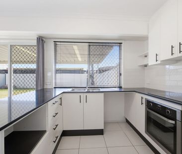 MODERN DUPLEX IN A PRIME POSITION - Photo 2