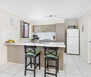 Low maintenance family living - Photo 2