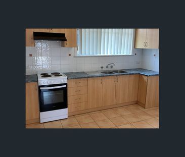 Quiet & Convenient – Low-Maintenance Unit in a Prime Location - Photo 2