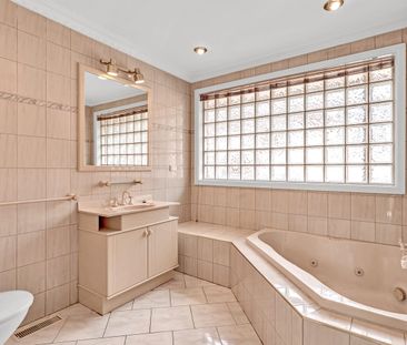 Spacious Three Bedroom Brick Home with Multiple Living Areas and Am... - Photo 5