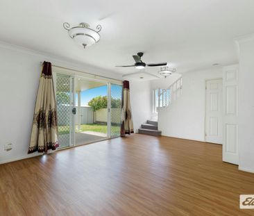 Spacious Family Home with Multiple Living Areas & Air Conditioning - Photo 2