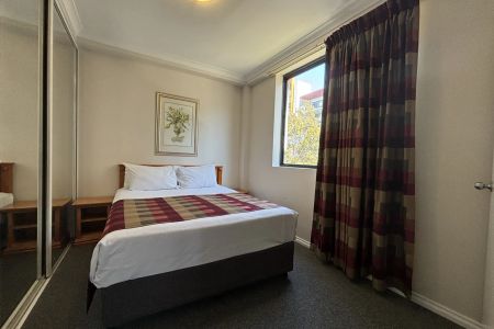 Furnished 2-Bedroom Apartment with Pool & Gym Access - Photo 5