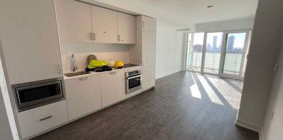 Brand New Queen St. East Condo 5 mins walk to Eaton center for Rent - Photo 2