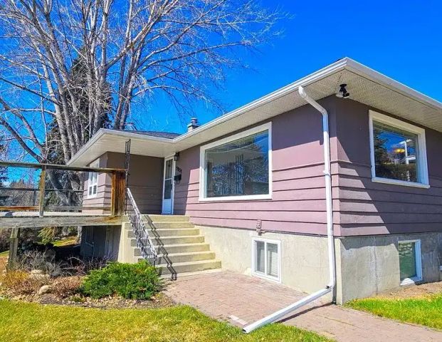 Unobstructed Skyline Views | 4 Bed, 2 Bath Single-Family Home in Briar Hill — 4 Bedrooms House - Photo 1