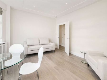 *Maximum occupancy of two sharers* Recently refurbished three bedroom flat in a portered building located at Brompton Cross in the heart of South Kensington. - Photo 4