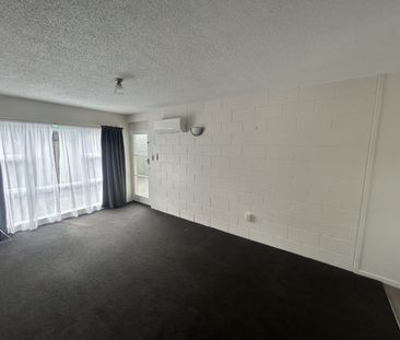 This tidy two-bedroom ground-floor unit is located in a quiet block... - Photo 2