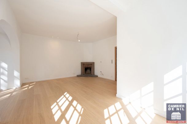 Gerenoveerde, ongemeubelde koppelvilla met zuidgerichte tuin palend aan de golf - Zoute - Photo 1