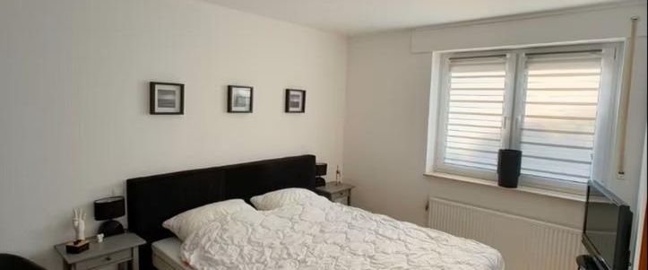 Ruhige 2-Zi Souterrain Wohnung mit Terrasse, EBK und Garage - Foto 1