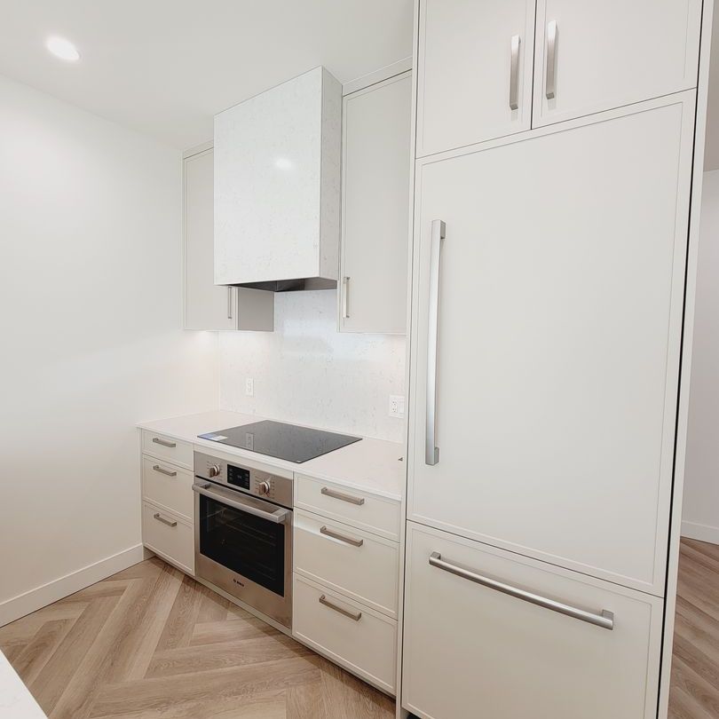 Upscale 1 bed + den condo at Movala - Photo 1