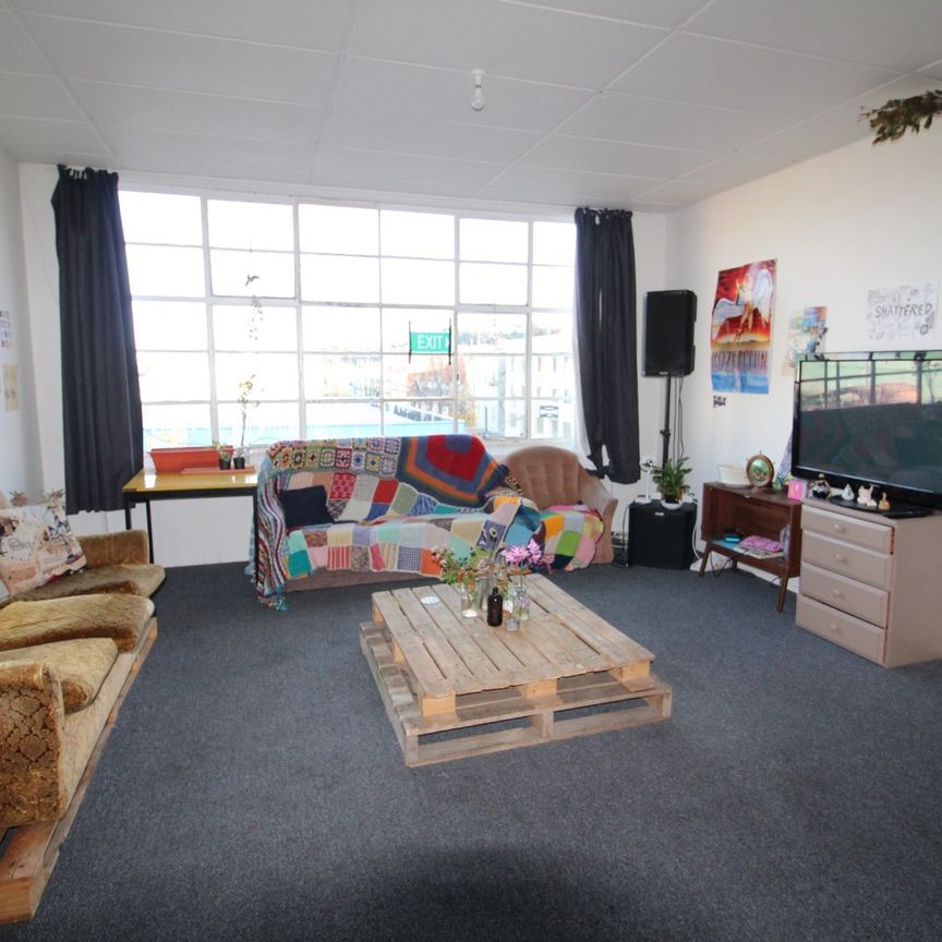 Awesome 4 Bedroom Central City Crash Pad for 2026 - Photo 1