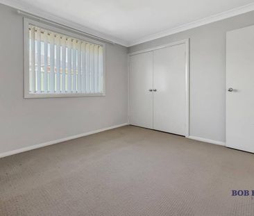 Comfortable 3 Bedroom Home with Large Shed - Photo 3