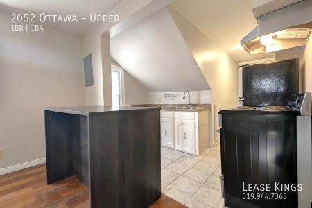 1 Bed 1 Bath Upper on Ottawa - Off Street Parking and In-Unit Laundry Included! - Photo 2