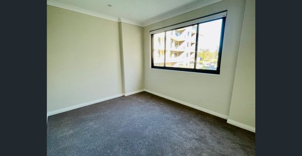 OVERSIZED TWO BEDROOM WITH TWO BASEMENT PARKING FOR LEASE - Photo 1