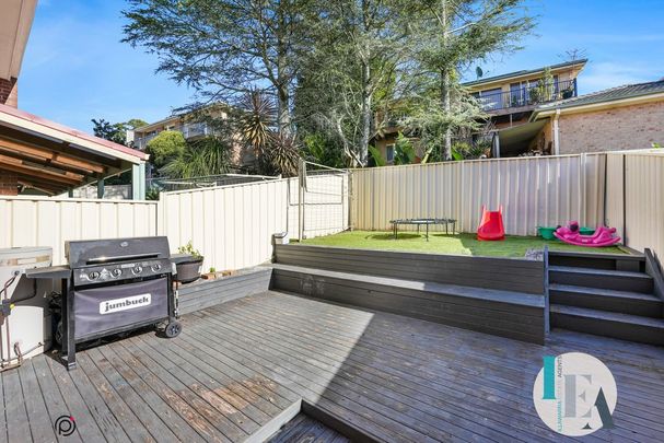 Immaculate Two-Bedroom Townhouse in Prime but Peaceful Location - Photo 1
