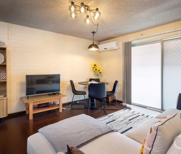 Open the Door to Beachside Ease - Photo 2