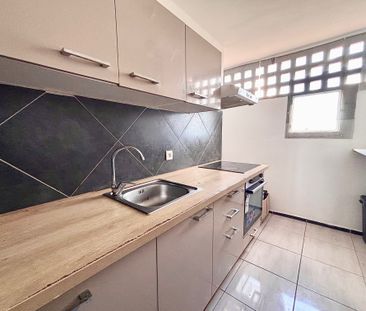 Location Appartement 4 pièces 82m² LES ABYMES 97139 - Photo 4