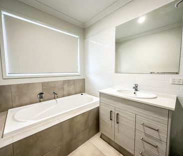 Spacious & Modern Family Home in Popular Location - Photo 6