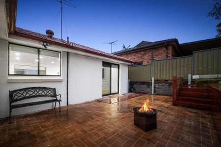 Stylish Family Living in a Peaceful Location - Photo 5