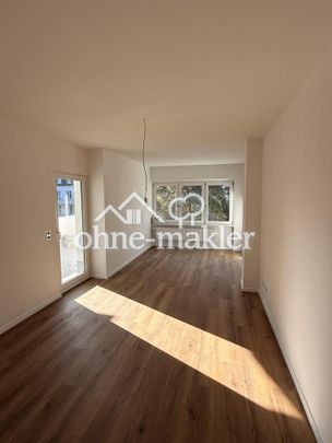 Erstbezug nach Sanierung: Wohntraum mit Südbalkon - Foto 1