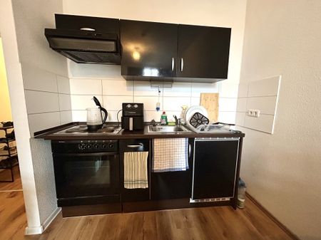 Gemütliches Wohnen mit Charme: 1-Raum-Wohnung in Magdeburg mit Terrasse! - Photo 3