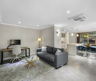 Unlock Comfort: Your Furnished Modern Retreat Awaits - Photo 3