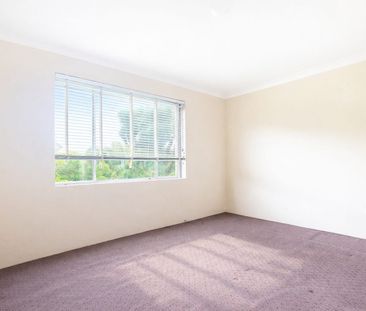 Sunlit, 2 bedroom residence with a lock up garage - Photo 1