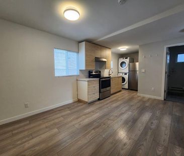 One Bedroom Ground Level Suite Including Utilities and One Parking ... - Photo 1