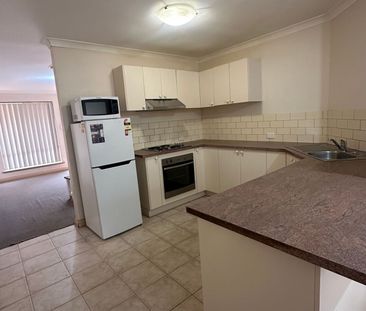 LOW MAINTENANCE & FULLY FURNISHED UNIT! - Photo 6