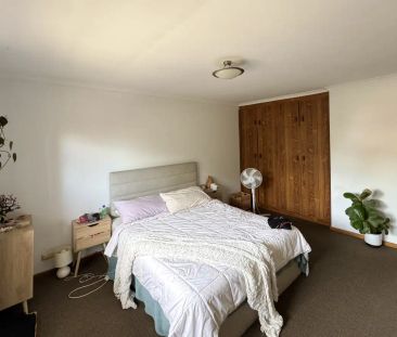 “Hi, I’m your well-located spacious 2-bedroom townhouse” - Photo 1