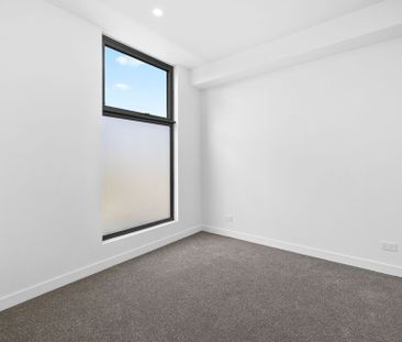 Luxury Three-Storey Townhouse in the Heart of McKinnon Secondary Co... - Photo 1