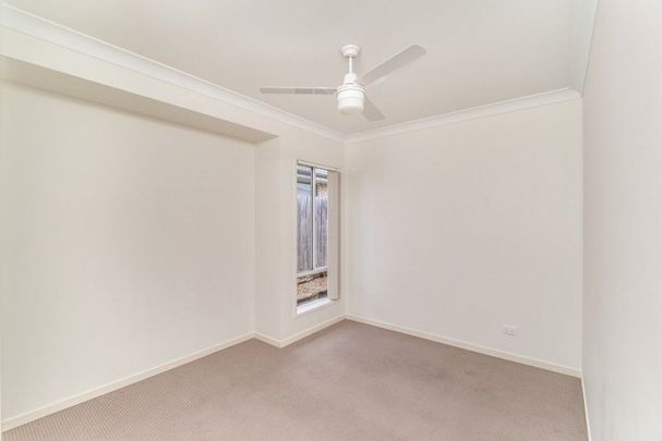 Spacious 4 bedroom home on a large block - Photo 1