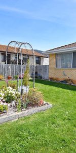 Comfortable Family Living with Bonus Sunroom! - Photo 4