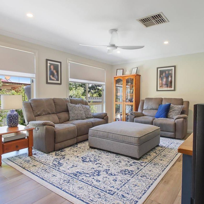 WELL PRESENTED FAMILY HOME! - Photo 1