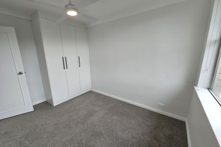 IMPECCABLY RENOVATED APARTMENT OFFERING COMFORT, STYLE AND CONVENIENCE - Photo 5