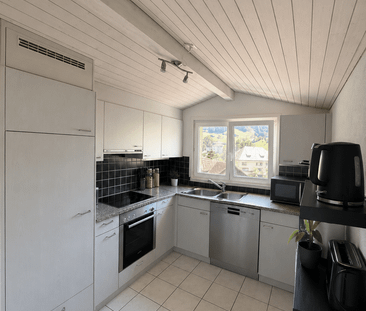 Charmante Dachwohnung an ruhiger Lage - Foto 1