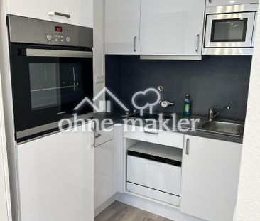 Moderne vollmöblierte 1-Zimmerwohnung mit Blick in die Stadt - Photo 1