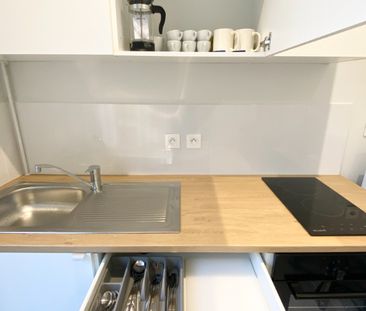 Location Appartement 1 pièce 17m² LYON 8ème - Photo 4