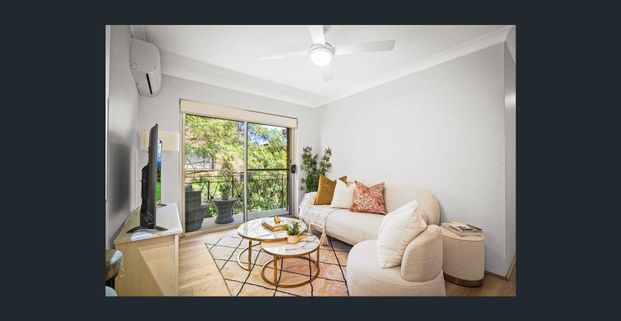 Beautifully Renovated Two-Bedroom Apartment in the Heart of Merrylands - Photo 1