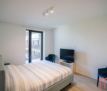 Dit prachtige appartement op het 4de verdiep van residentie “One Baelskaai” in Oosteroever, Oostende, heeft veel te bieden voor wie op zoek is naar een leuke plek om te wonen. - Foto 3