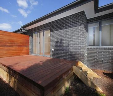 MODERN UNIT WITH PRIVATE COURTYARD AND CARPORT - Photo 3